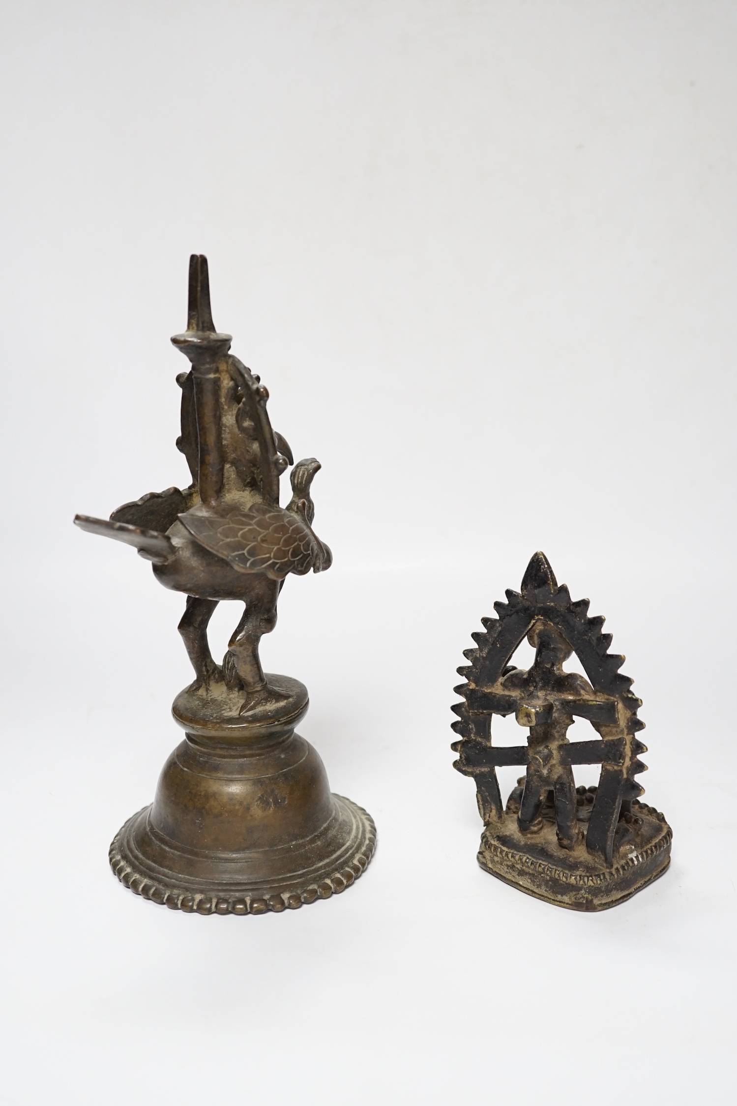 An 18th century Indian bronze figure of Garuda and an 18th century Indian Bronze statue of Shiva Yogi, largest 23cm high